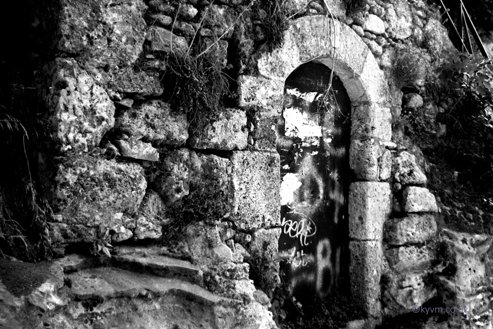 There are in Greece a great many doors and these doors attract a range of people from vandals to artists to philosophers and photographers.  This one, aged, weathered and unused. Leading to some unknown and forgotten place is one of those.