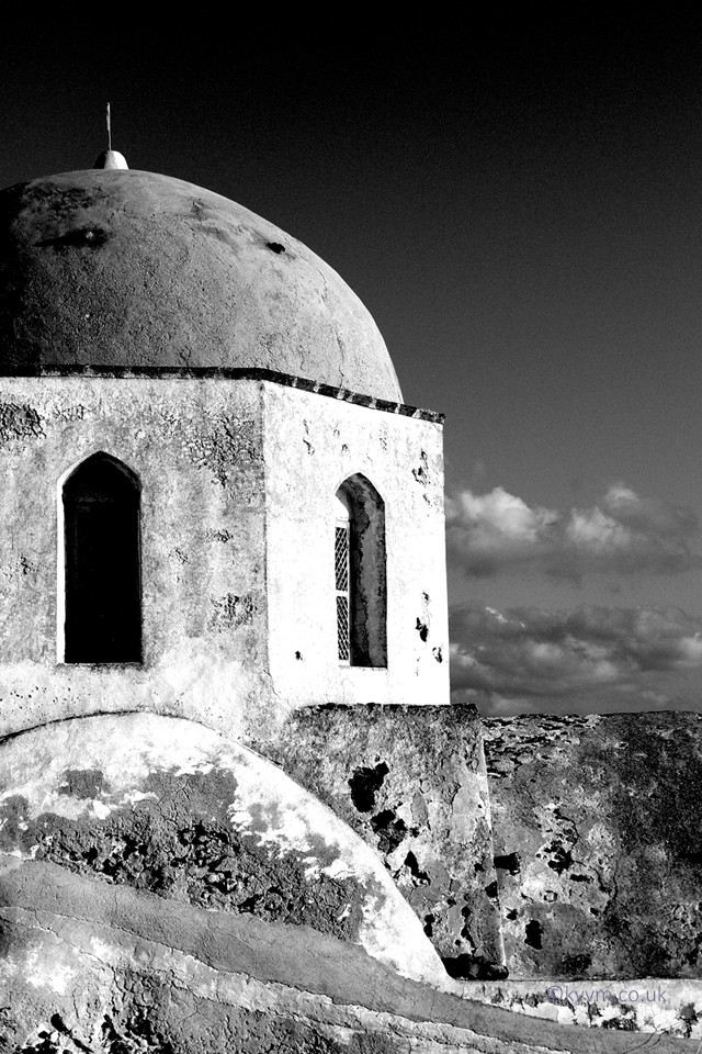 Santorini (Thira) is the quintessential Greek island to photograph, although I did not know this at the time.  The blue roofed church domes dashed throughout the towns appear frequently on postcards all over.   I knew I wanted one, and indeed took many, but it is this one that takes me back.